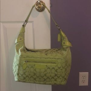 Coach bag and checkbook wallet.